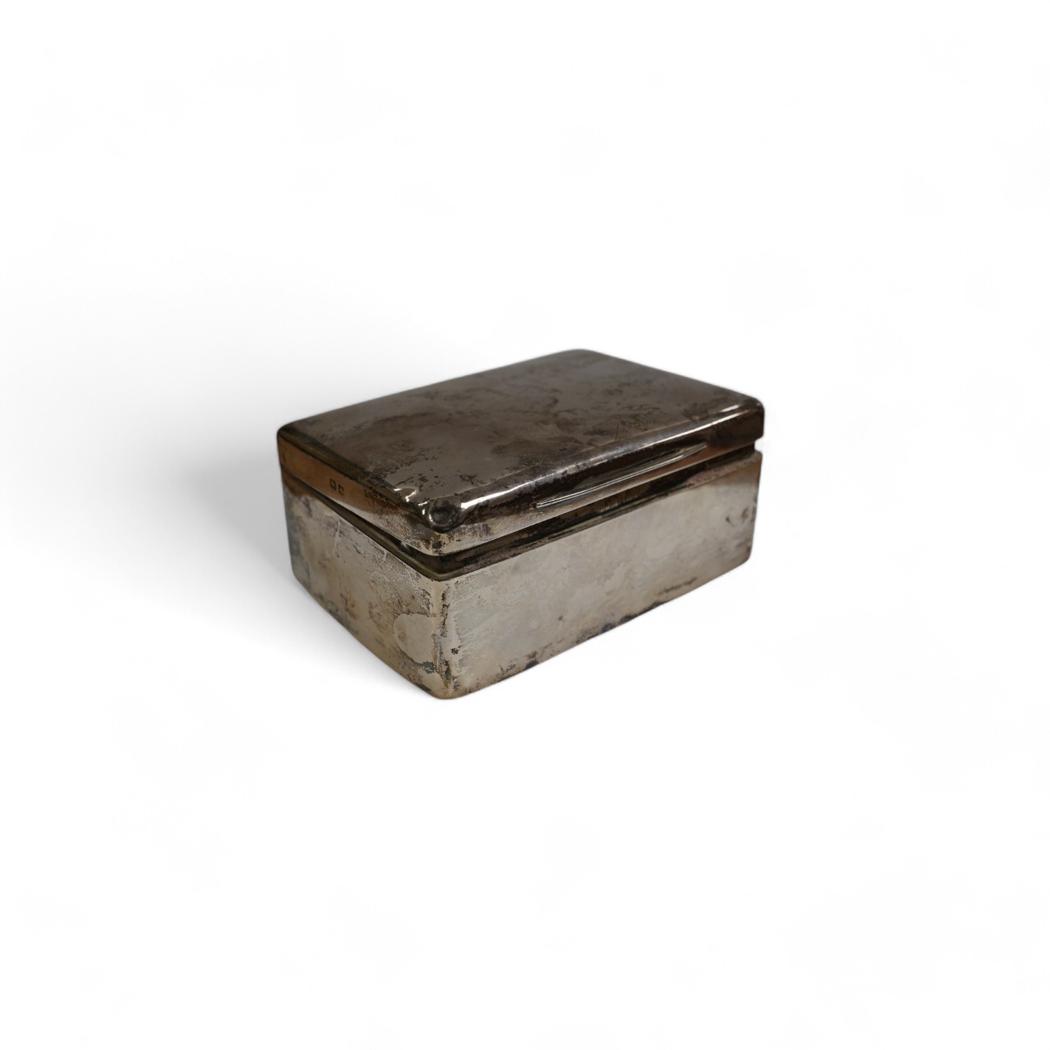 A George V silver mounted rectangular cigarette box, D. Bros, Birmingham, 1914, 12.4cm. Condition - poor